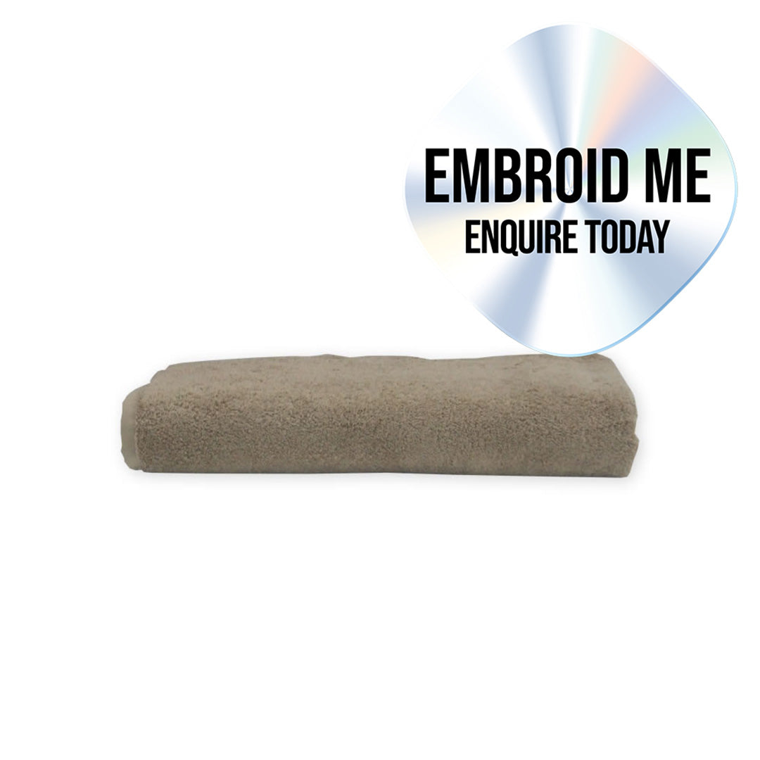 Brown towel on a white background with 'Embroid Me' text overlay.