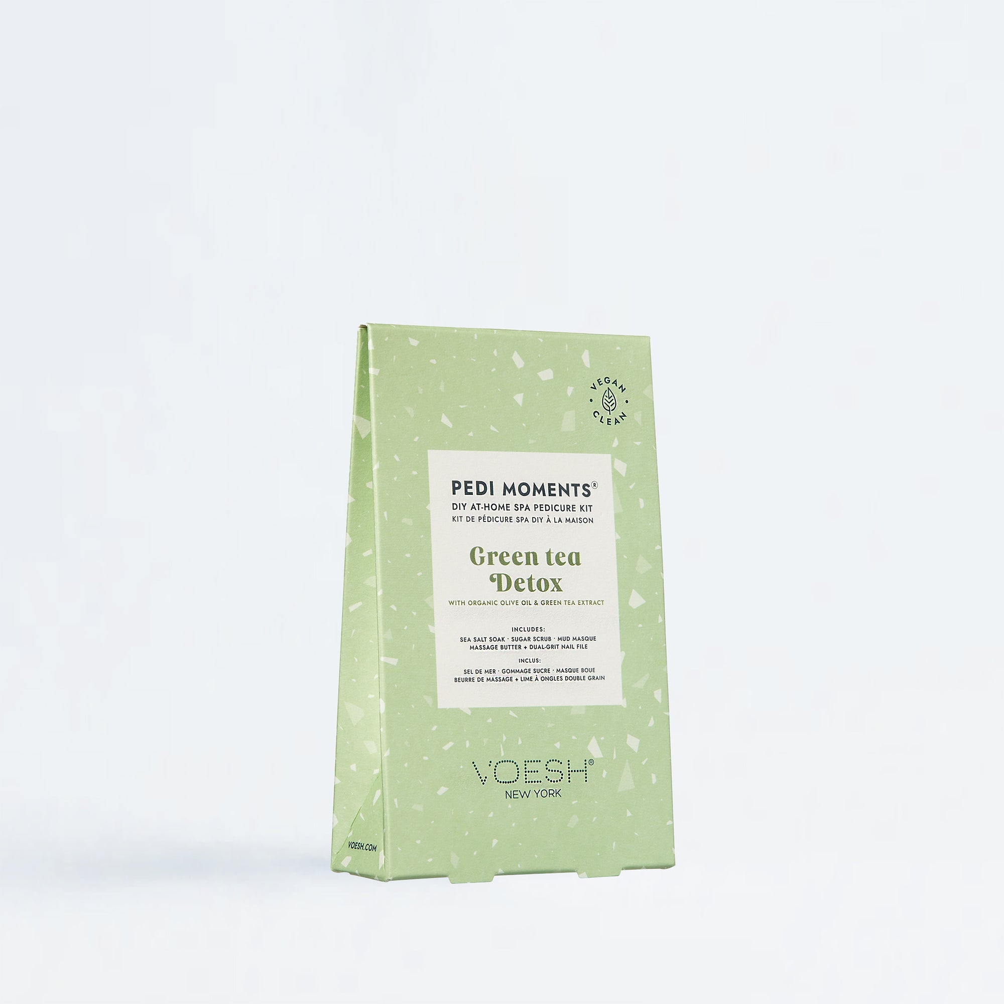 Green tea detox package by Voesh on a white background