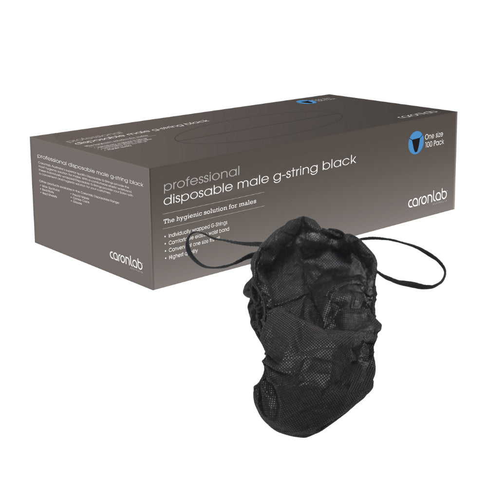 Black disposable male g-string with packaging on a white background