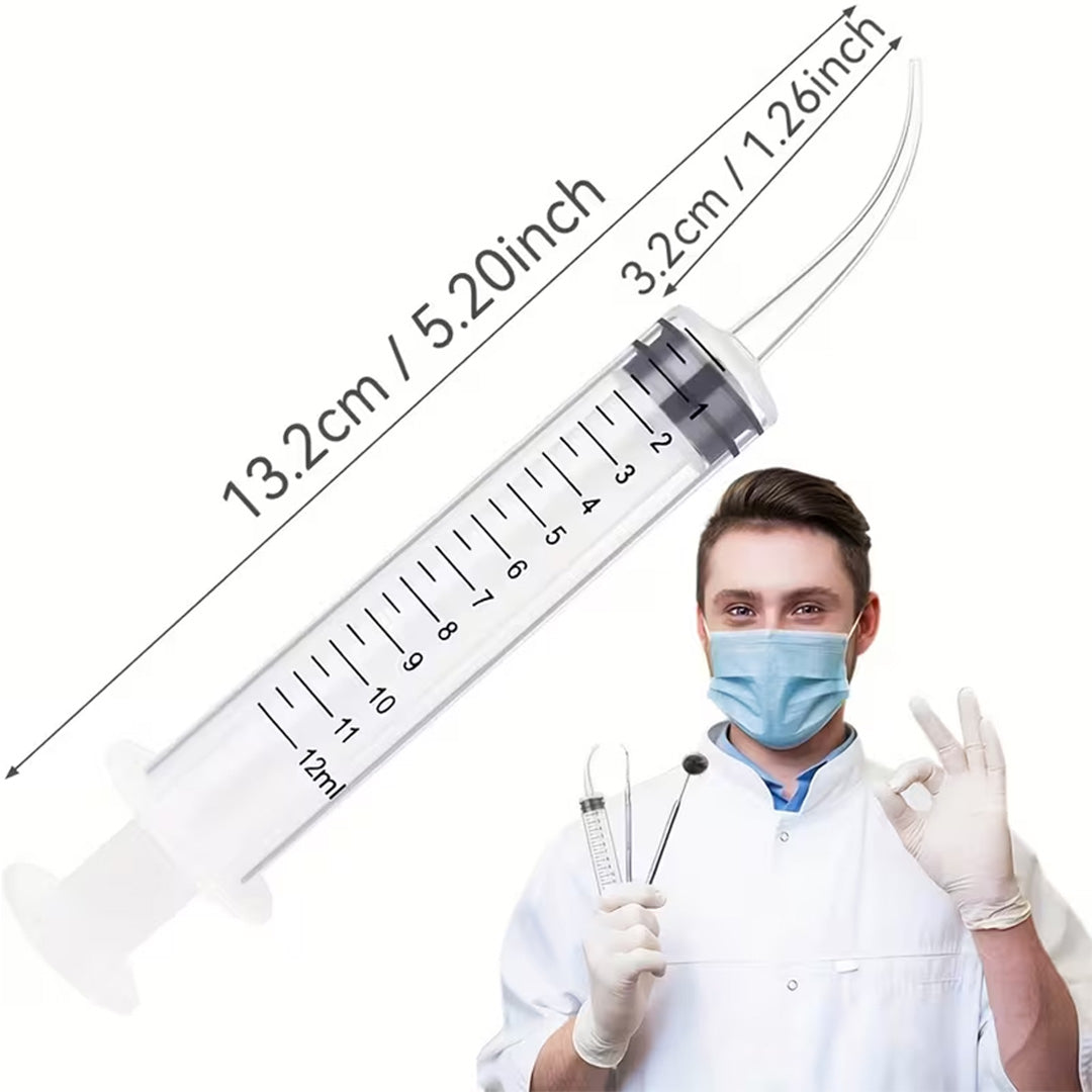 Doctor holding a large syringe with measurements and a smaller syringe, wearing a face mask and gloves.