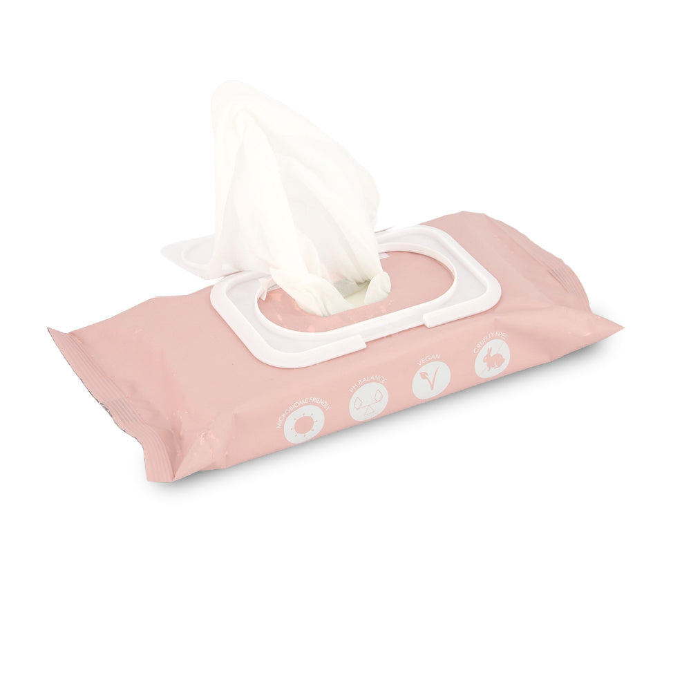 Pink tissue packet with a white tissue on a white background