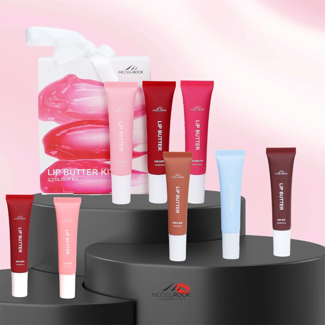 Collection of lip butter products on a black stand with a pink gradient background