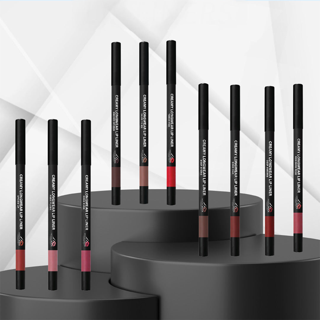 Set of black lip liner pencils on a gray platform with a white geometric patterned background