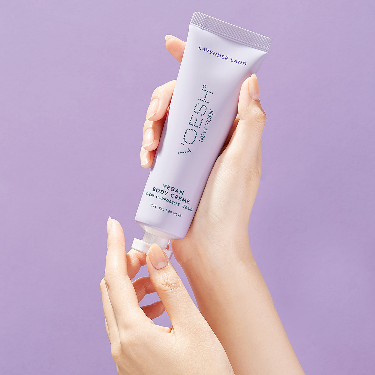 Lavender Land vegan hand and body creme in use