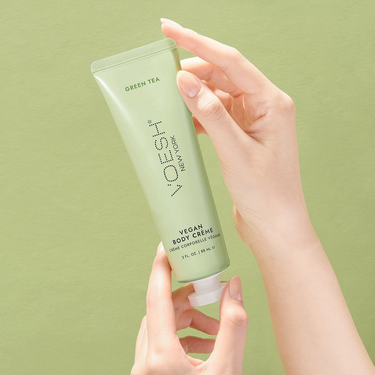 Green Tea vegan hand and body creme in use