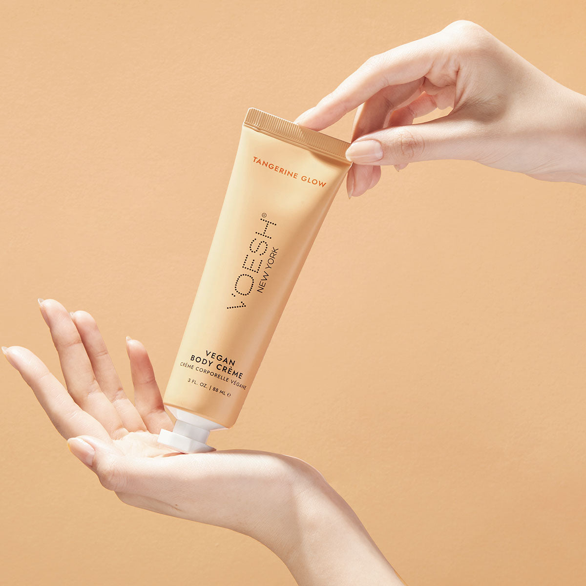 Tangerine Glow vegan hand and body creme in use